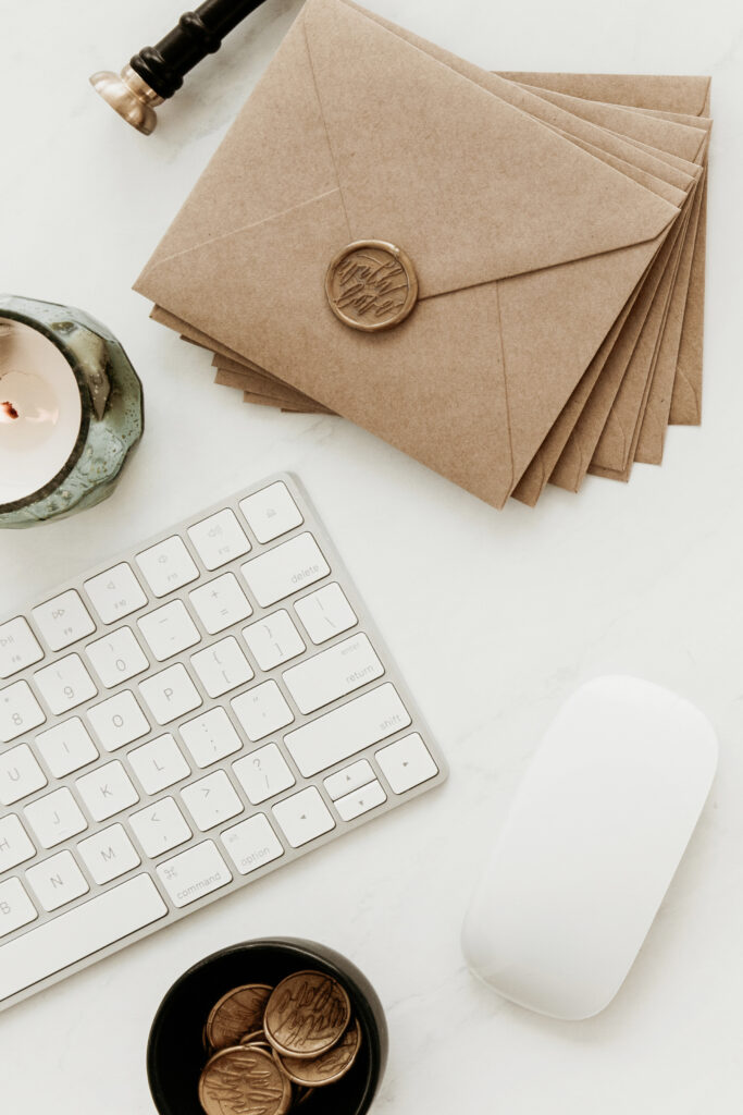 Wedding planner planning marketing content at her desk, illustrating a healthy visibility mindset as a wedding planner focused on sustainable visibility, consistent content, and marketing that fits a full life.