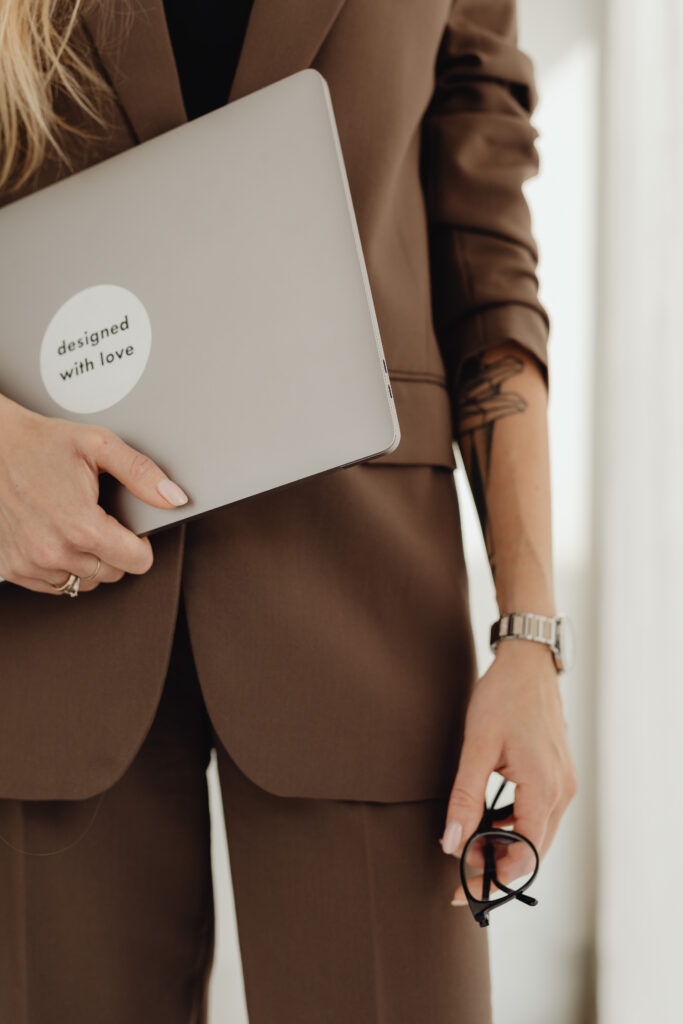 Wedding professional listening to a business podcast while working, representing how curated podcasts support strategic thinking and sustainable growth in the wedding industry.