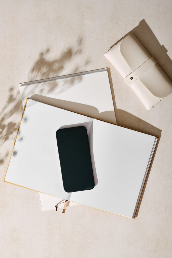 Minimal workspace representing strategic planning and long-term marketing decisions for growing a successful wedding planning business.